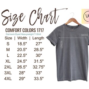 May include: A gray Comfort Colors 1717 heavyweight t-shirt displayed on a wooden hanger. The image includes a size chart with measurements in inches for sizes S through 4XL. The text "Size Chart" is at the top.
