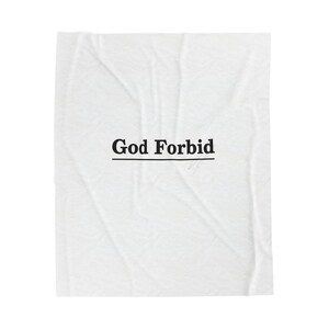 May include: White fabric with the text "God Forbid" in black, centered and underlined. The fabric has a subtle, textured pattern. The overall aesthetic is minimalist and modern.