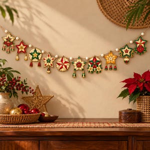 May include: A decorative garland featuring a series of hanging star-shaped ornaments in red, green, and gold colors, interspersed with small white beads on a string. The ornaments display intricate geometric patterns and floral motifs.