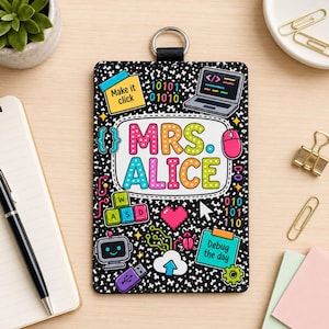 May include: A rectangular ID badge holder with a black and white speckled background featuring colorful computer-themed graphics, including a laptop, mouse, keyboard keys, and a robot. The text reads MRS. ALICE, Make it click, and Debug the day.