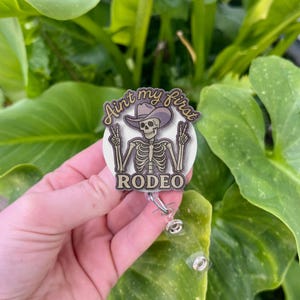 Faux Glitter Skeleton Cowboy Badge Reel: Funny Western Work Accessory
