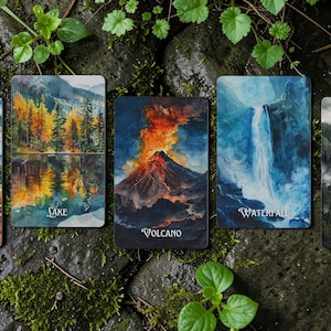 May include: Five rectangular cards featuring nature illustrations labelled Roots, Lake, Volcano, Waterfall, and Fog. Each card displays a detailed landscape painting with vibrant colours, including a tree, a reflective lake, an erupting volcano, a cascading waterfall, and a misty forest scene.