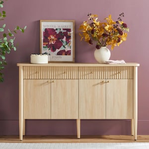 Puede incluir: Un juego de tres tazas de cerámica con un acabado moteado y mate. Las tazas son de color crema, gris claro y gris oscuro. Cada taza tiene un diseño simple y minimalista, ideal para café o té.