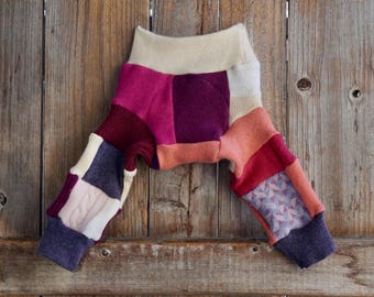 Otulacz na pieluchę Longies Soaker wykonany w 100% z kaszmiru z recyklingu, z podwójnym wzorem dla dziewczynki w patchworkowe wzory, dla noworodka (0-3 miesiące)