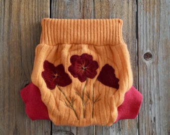 Otulacz na pieluchę z kaszmiru z recyklingu, pomarańczowy/różowy z aplikacją maków, mały (3-6 miesięcy)