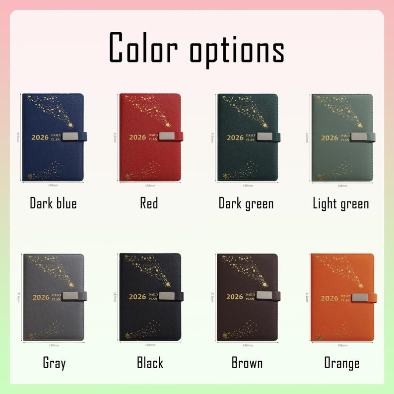 May include: A selection of 2026 daily plan notebooks in various colors, including dark blue, red, dark green, light green, gray, black, brown, and orange. Each notebook features a clasp closure and a celestial design. The notebooks are approximately 140mm wide and 215mm tall.