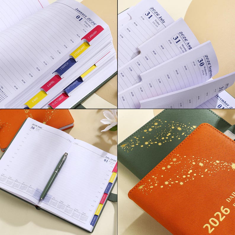 May include: A collection of open 2026 daily planners with colorful month tabs. The planners have a leather-like cover in orange and green. One planner is open to a page with a pen.