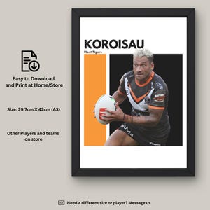 May include: Framed poster featuring a rugby player in a black and orange jersey holding a rugby ball. The poster includes the name "KOROISAU" and "West Tigers". The poster size is 29.7cm x 42cm (A3).