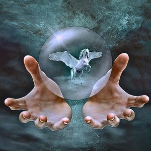 May include: A digital art piece featuring a white unicorn with wings inside a glowing orb, held between two hands. The background is a dark, textured teal with hints of white and gray.