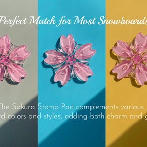 May include: Three pink, flower-shaped stomp pads for snowboards. The pads have a clear, textured design with a pink center. The background is divided into three sections: gray, blue, and yellow.