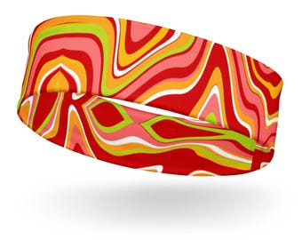 Puede incluir: Una colorida diadema con un vibrante patrón de remolino. El diseño presenta líneas onduladas rojas, naranjas, amarillas, rosas, verdes y blancas. Este accesorio está diseñado para ser usado alrededor de la cabeza.