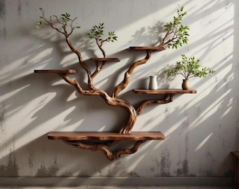 May include: A unique, wooden tree-shaped wall shelf with multiple platforms. The shelf is made of natural-toned wood, with branches extending to hold small, square shelves. Green leafy branches are attached to the wooden structure. Two small white vases and a brown vase are on the shelves.