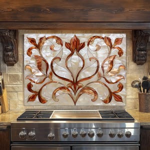 May include: A decorative kitchen backsplash featuring a floral design in shades of copper and white. The backsplash is installed above a stainless steel gas range. The kitchen has dark wood cabinetry and a stone countertop.