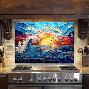 May include: A colorful ocean-themed artwork featuring a sunset over the sea. The image showcases a large wave with white foam, a yellow sun, and birds in flight. The sky transitions from blue to red, creating a vibrant scene.