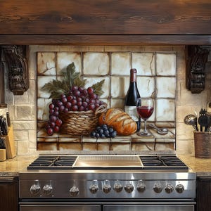 May include: A kitchen backsplash featuring a still life painting of a basket of grapes, a loaf of bread, a bottle of wine, and a glass of red wine. The painting is set against a backdrop of square tiles.