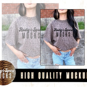 May include: A taupe leopard print sweatshirt with the text "Rusty + Spurs Mocks" printed on the front. The image also includes the text "HIGH QUALITY MOCKUPS" in a black banner.
