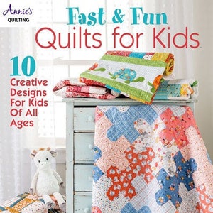 May include: A book cover featuring a colorful patchwork quilt with the title "Fast & Fun Quilts for Kids" and the subtitle "10 Creative Designs for Kids of All Ages".