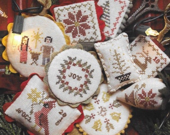 HEARTSTRING SAMPLERY Stitching Edition Festive Little Fobs series counted cross stitch patterns at thecottageneedle.com