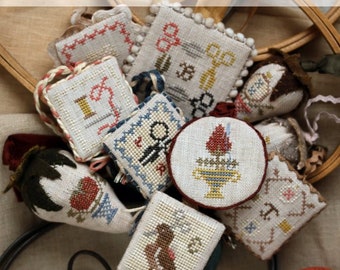 HEARTSTRING SAMPLERY Stitching Edition Festive Little Fobs series counted cross stitch patterns at thecottageneedle.com