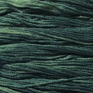 May include: Close-up of a bundle of dark teal embroidery floss. The floss has a slight sheen and a textured appearance. The color varies from dark teal to a lighter, muted green, creating a subtle gradient effect. Ideal for embroidery and other crafts.