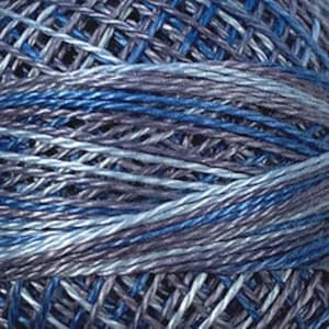 May include: A skein of blue, gray, and white embroidery floss. The floss is wound around a white ball.