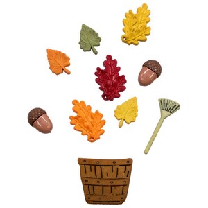 May include: A set of fall-themed craft supplies, including a wooden bucket, acorns, leaves, and a rake. The leaves are in various colors, including red, orange, yellow, and green.