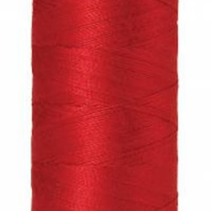 May include: A spool of red thread with a green label that reads "Metzler Silk Finish No. 60 2000m/220yd".