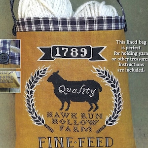 May include: A yellow canvas bag with a black and white plaid trim and a black handle. The bag has a black sheep silhouette with the word "Quality" printed on it. The bag also has the text "1789", "Hawk Run Hollow Farm", "Fine Feed", and "30 lbs net USA".