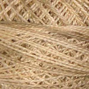 May include: Close-up of a skein of beige yarn with a subtle shimmer. The yarn is made of a blend of silk and cotton.