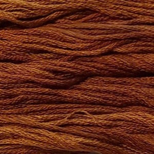 May include: Close-up of a skein of brown embroidery floss. The threads are tightly wound, creating a textured surface. The color is a warm, earthy brown, with variations in tone. Ideal for embroidery and other crafts.