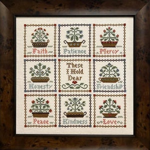 May include: A cross-stitch sampler with a white background and a grid of nine squares. Each square features a potted plant with a different colored flower and a word below it. The words are "Faith", "Patience", "Mercy", "Honesty", "These I Hold Dear", "Friendship", "Peace", "Kindness", and "Love".