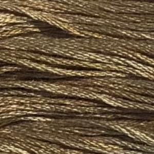 May include: Close-up of a skein of embroidery floss in a muted olive green color. The thread has a slight sheen, with visible strands and subtle variations in tone. The floss appears soft and flexible, suitable for various needlework projects.