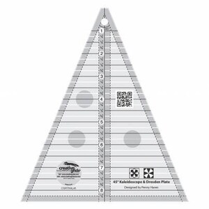 May include: A clear plastic 45-inch quilting ruler with a triangle shape and markings for creating kaleidoscope and Dresden plate designs. The ruler has a QR code and the text "45" Kaleidoscope & Dresden Plate Designed by Penny Haren".