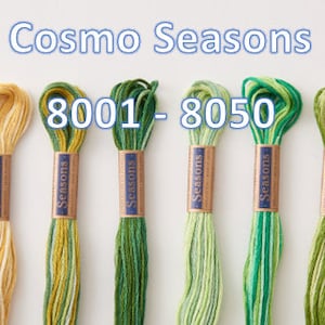 May include: Six spools of Cosmo embroidery floss in shades of green and yellow. The floss is labeled "Cosmo Seasons 8001-8050".