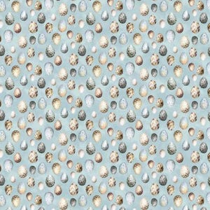 May include: A repeating pattern of speckled eggs in shades of brown, tan, and white arranged on a light blue background. The eggs vary in size and density of their dark brown spots, creating a textured, multi-colored surface design.