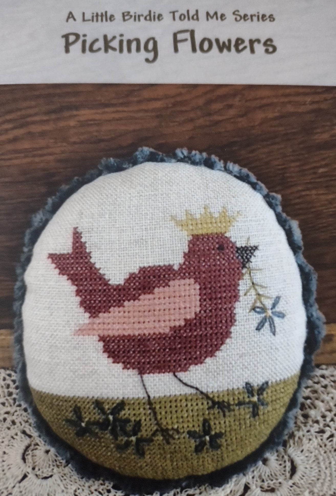 Stitch a beautiful cross stitch bird: Try cross stitch on linen