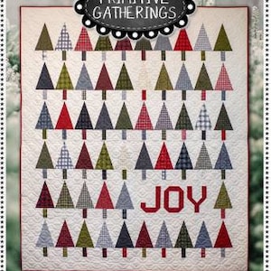 May include: A quilt pattern featuring a white background with a grid of red, green, and blue patchwork triangle trees. The quilt is titled "Tree Lot" and includes the word "JOY" in red letters in the center.