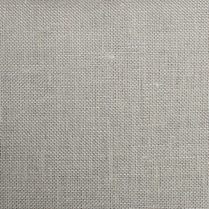 Puede incluir: Primer plano de una tela tejida beige con una textura fina y uniforme. La tela tiene una superficie ligeramente rugosa y un brillo sutil.