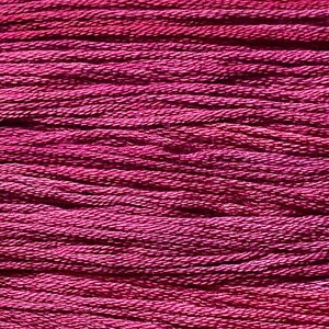 May include: Close-up of a bundle of deep pink embroidery floss. The floss is arranged in parallel lines, creating a textured surface.
