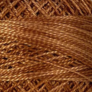 May include: A spool of brown embroidery floss.