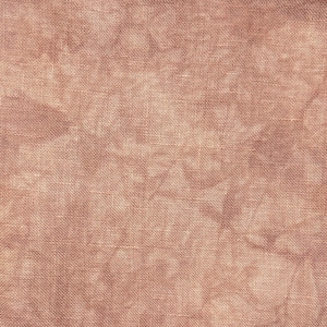 May include: Close-up of a textured, reddish-brown fabric. The material has a woven appearance with subtle variations in color and texture, creating a slightly mottled effect. The fabric appears to be a natural fiber, possibly linen or cotton.
