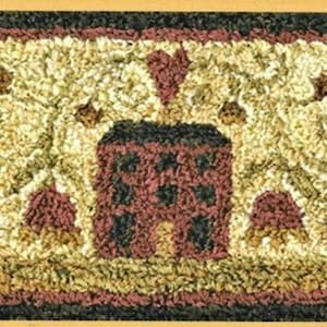 May include: A rectangular rug with a brown house in the center surrounded by a floral pattern in shades of brown, cream, and red.