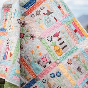 May include: A set of three ceramic mugs with a speckled, matte finish. The mugs are in shades of cream, light gray, and dark gray. Each mug has a simple, minimalist design, perfect for coffee or tea. The mugs are stacked on top of each other.