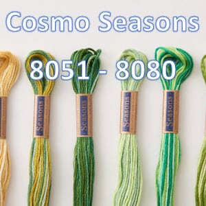 May include: Eight spools of embroidery floss in shades of yellow and green. The floss is labeled "Cosmo Seasons" and the numbers 8051-8080.