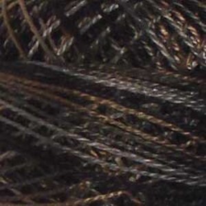 May include: Close-up of a pile of dark brown and black twisted yarn.
