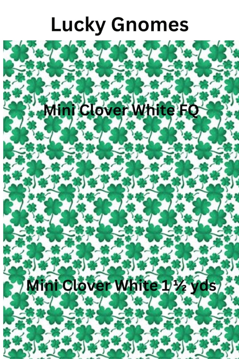 May include: A white fabric featuring a repeating pattern of green four-leaf clovers. The text Lucky Gnomes, Mini Clover White FQ, and Mini Clover White 1 1/2 yds is printed over the clover design in a clear, bold black font.