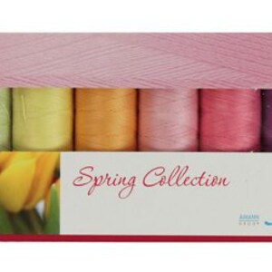 May include: A box of 10 spools of thread in pastel colors, labeled "Spring Collection" and "Mettler".