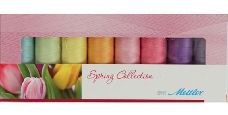 May include: A box of 10 spools of thread in pastel colors, labeled "Spring Collection" and "Mettler".