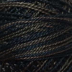 May include: A spool of dark blue, brown, and burgundy embroidery floss.