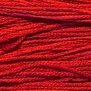 May include: Close-up of a skein of red embroidery floss. The threads are tightly wound, creating a textured surface. The color is a deep, rich red, with subtle variations in tone. Ideal for cross-stitch, embroidery, and other needlecraft projects.